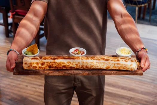 loaded chicken burrito with fresh guacamole salsa