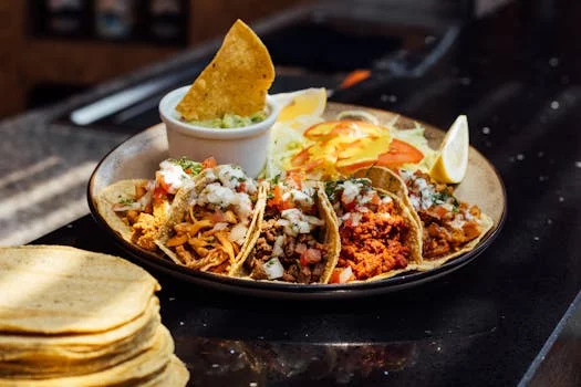 crispy beef tacos with fresh toppings lime